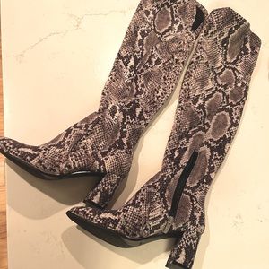 Snakeskin over the knee boots
